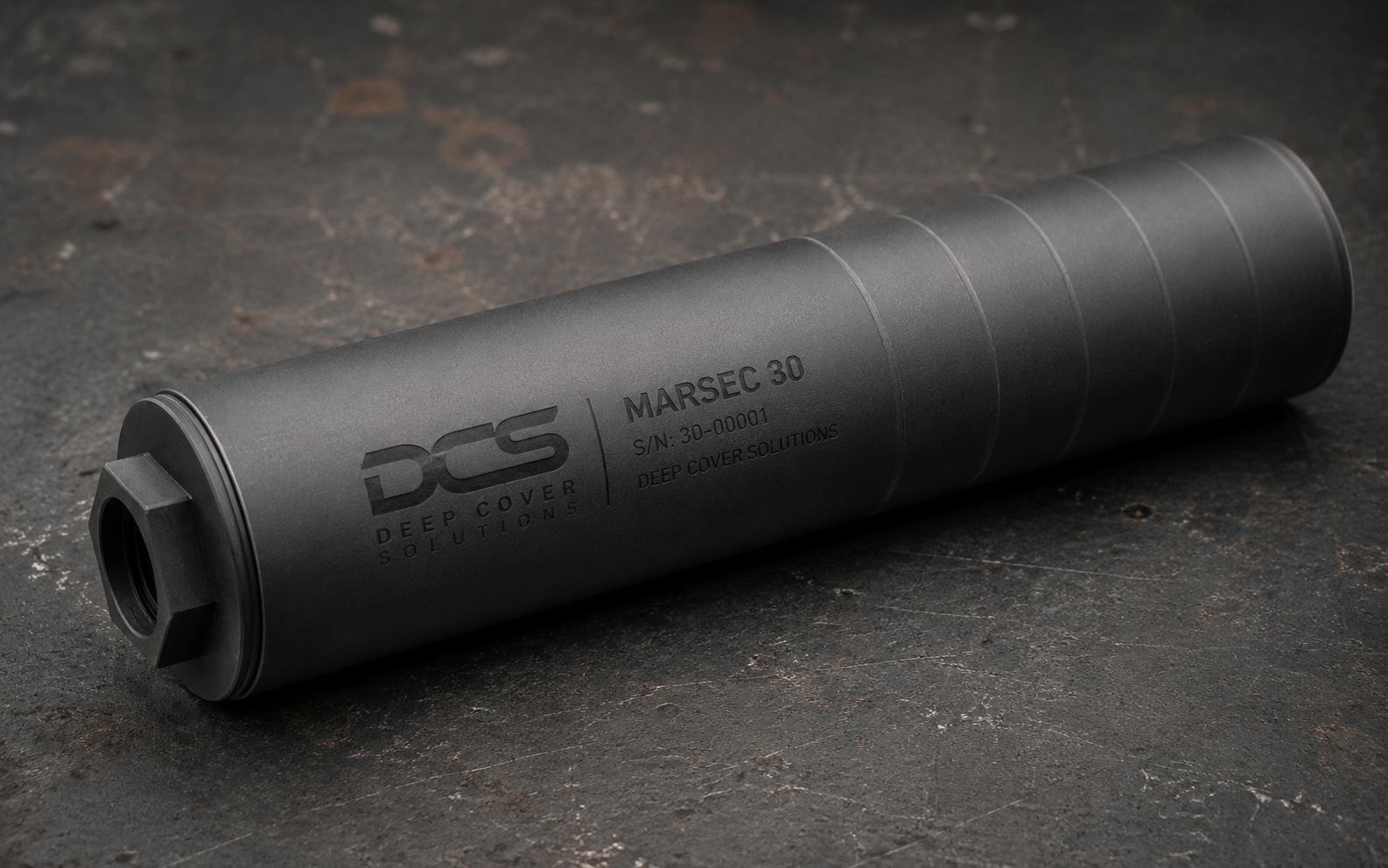 Black MARSEC 30 suppressor with engraved DCS markings
